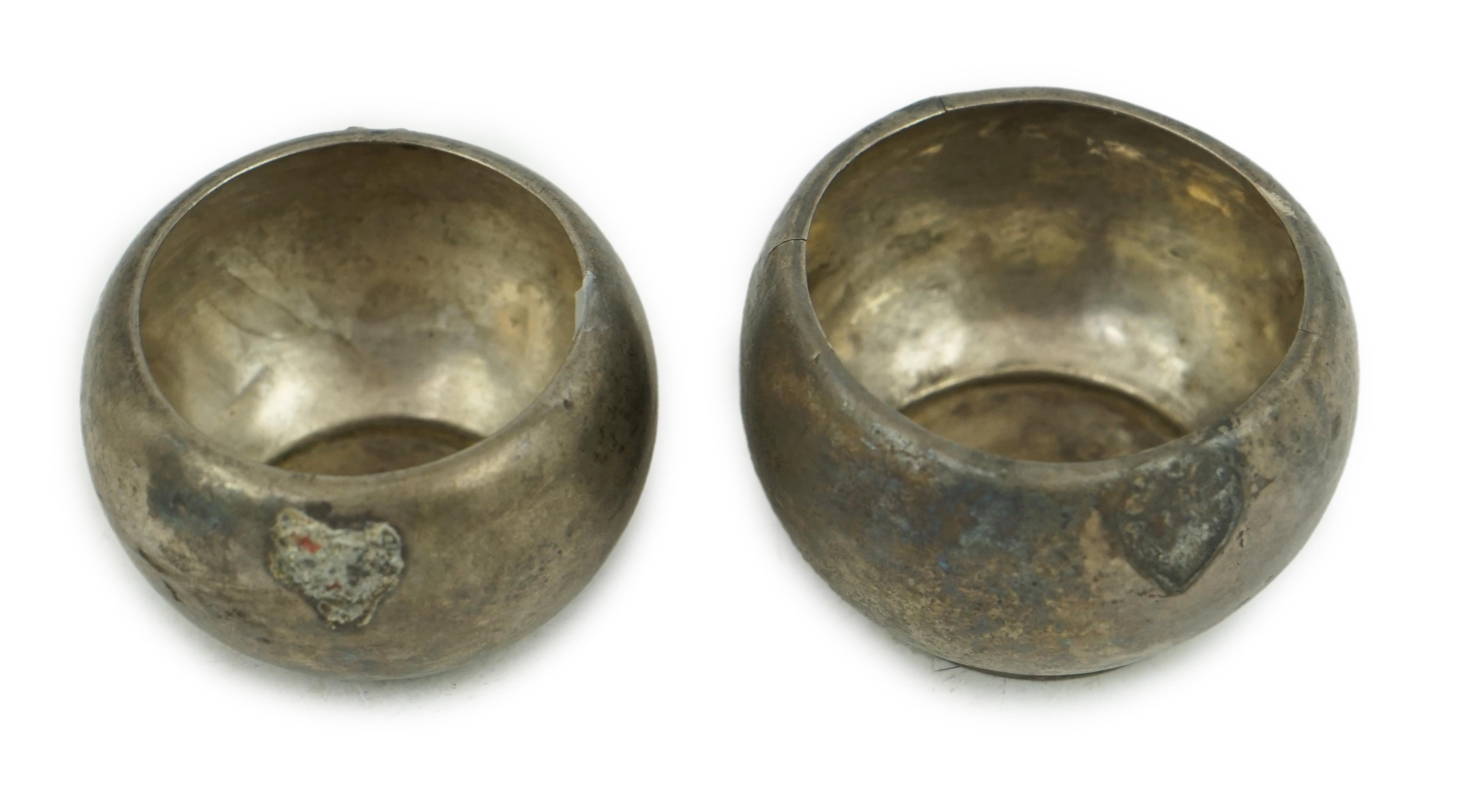 Two silver aryballoi, lacking handles, Roman or Gandhara, c. late 1st century BC - early 1st century A.D.